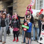 a section from a protest outside norwich city hall against bedroom tax evictions a3 (18960190878)
