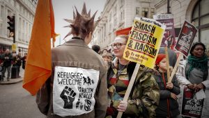 refugees welcome, oxford circus, westminster, england, march 2023